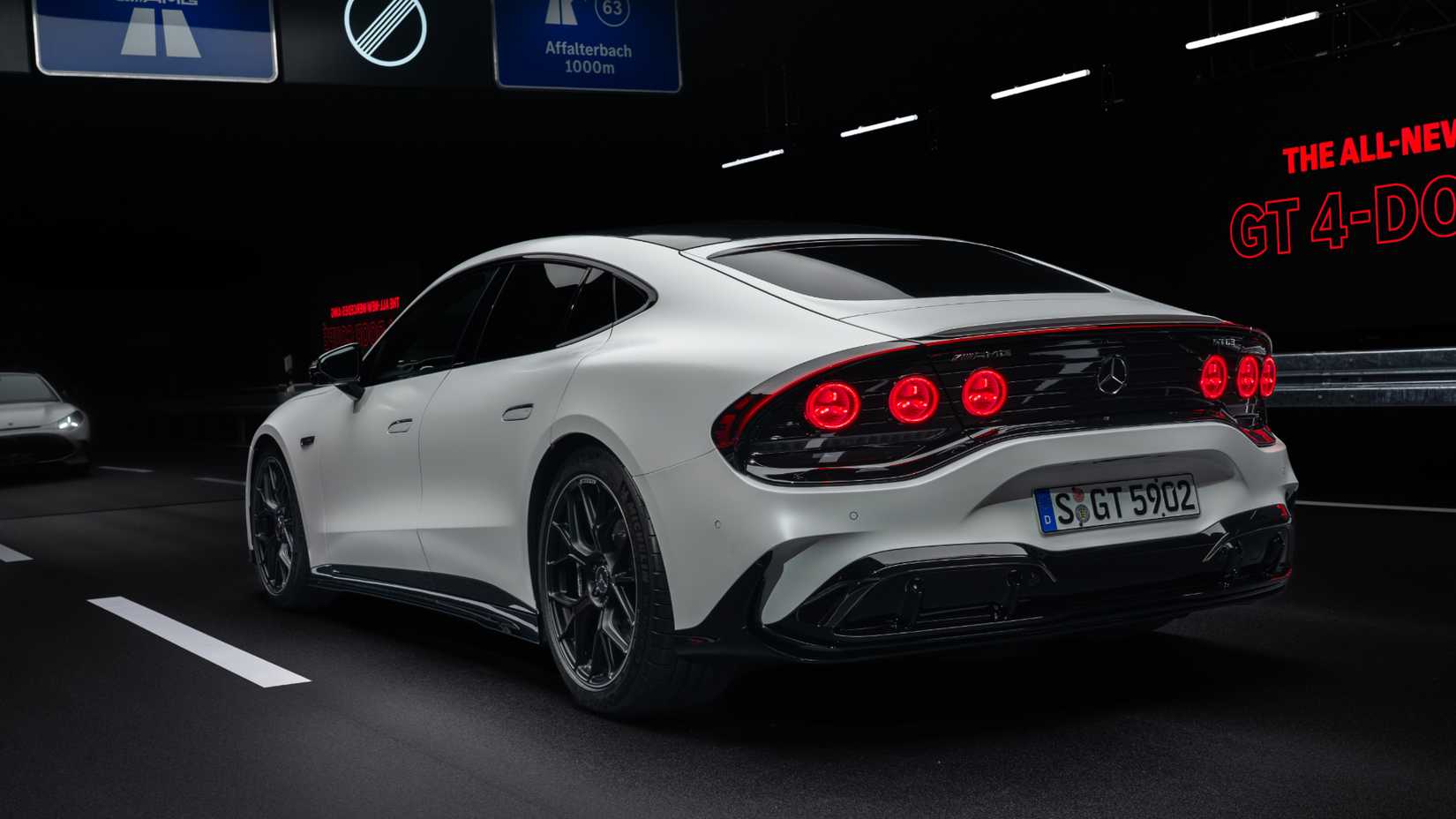 2027 Mercedes-AMG GT 4-Door Coupe electric white studio exterior (7)